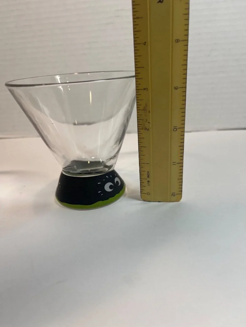 Set Of 2 Clear Glass Monster-Themed Shot Glasses with Black and Green Base Desig
